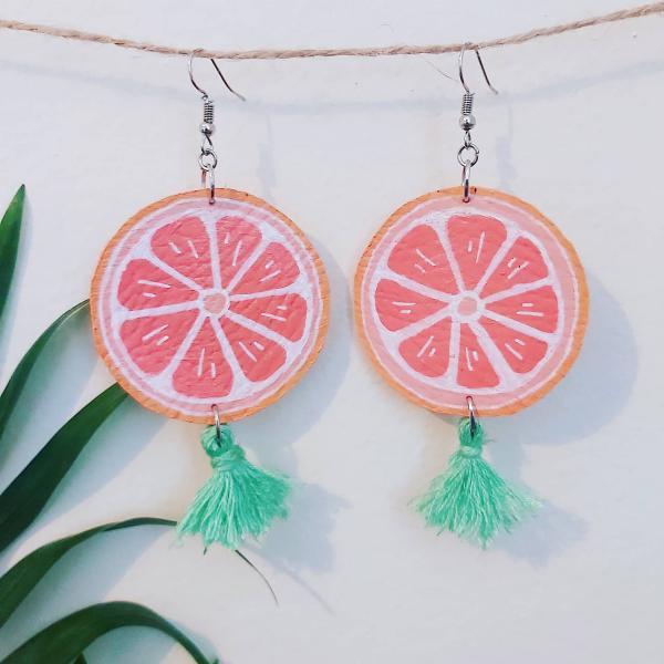 Grapefruit earrings , fruit earrings , dangle earrings with tassels . Acrylic painted faux leather